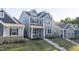 Charming two-story home with covered front porch and landscaped yard at 636 Ginger Mint Cir, Knightdale, NC 27545