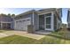 Attached garage and screened in porch of this home at 636 Ginger Mint Cir, Knightdale, NC 27545