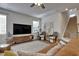 Inviting living room with a comfortable sofa, stylish decor, and plenty of natural light at 636 Ginger Mint Cir, Knightdale, NC 27545