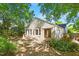 Backyard deck perfect for entertaining and relaxation; the home is surrounded by mature greenery at 708 Mills St, Raleigh, NC 27608