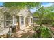 Charming home featuring a wooden deck with a grill and outdoor seating, perfect for entertaining or relaxing at 708 Mills St, Raleigh, NC 27608