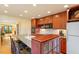 Well-appointed kitchen with ample counter space, custom cabinetry, and modern appliances, designed for culinary enthusiasts at 708 Mills St, Raleigh, NC 27608