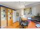 Functional office space with built-in shelving, desk area, and natural light at 708 Mills St, Raleigh, NC 27608
