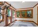 Inviting sunroom with natural light, tiled floor, and a bike storage solution at 708 Mills St, Raleigh, NC 27608