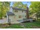 Back of home with deck and plenty of trees at 7213 St Ledger Dr, Raleigh, NC 27613