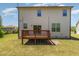 Spacious backyard with a wooden deck, perfect for outdoor relaxation and entertaining guests at 7508 Channery Way, Raleigh, NC 27616