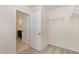 Walk-in closet connects to ensuite bathroom, featuring ample storage and organization with wire shelving at 7508 Channery Way, Raleigh, NC 27616