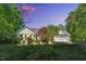 Exterior view of home with manicured lawn and beautiful landscaping, creating curb appeal at 76 Bergeson Ct, Fuquay Varina, NC 27526