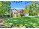 Charming single-story home with a well-manicured lawn and inviting front porch at 76 Bergeson Ct, Fuquay Varina, NC 27526