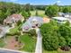 Beautiful home with professional landscaping, long driveway, and proximity to the golf course creating a peaceful retreat at 77 Ruffed Grouse, Chapel Hill, NC 27517