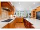 This kitchen features a spacious island, quartz countertops, and plenty of storage space at 77 Ruffed Grouse, Chapel Hill, NC 27517
