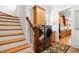 Convenient laundry room with modern appliances and stair access at 77 Ruffed Grouse, Chapel Hill, NC 27517