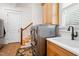 Practical laundry room with a sink, cabinets, and modern appliances at 77 Ruffed Grouse, Chapel Hill, NC 27517