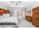 Well-lit bedroom showcases a serene sleeping space with elegant details and neutral tones at 77 Ruffed Grouse, Chapel Hill, NC 27517