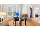 Stylish office featuring a glass desk, comfortable seating, and large window at 77 Ruffed Grouse, Chapel Hill, NC 27517