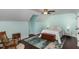 Light and airy bedroom with wood floors and neutral decor at 7901 Farnham Ct, Raleigh, NC 27615
