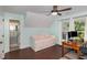 Bedroom with daybed, desk and attached bathroom at 7901 Farnham Ct, Raleigh, NC 27615