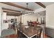 The dining area offers hardwood floors and an open floor plan with ample seating at the table at 7901 Farnham Ct, Raleigh, NC 27615