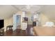 Efficiency apartment with a small kitchenette space, neutral colors, and natural light at 7901 Farnham Ct, Raleigh, NC 27615