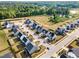 An aerial view shows new homes and mature trees in a well-planned neighborhood at 808 Buckner Ct, Fuquay Varina, NC 27526