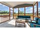 Inviting screened porch with comfortable seating, offering an outdoor retreat with views of the lush yard at 808 Buckner Ct, Fuquay Varina, NC 27526