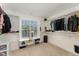 Spacious walk-in closet with natural light, custom shelving, and ample hanging space for organization at 808 Buckner Ct, Fuquay Varina, NC 27526