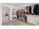 Walk-in closet offering built-in shelving and clothing racks for organized and accessible storage solutions at 808 Buckner Ct, Fuquay Varina, NC 27526