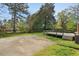 Large backyard with concrete pad and wooden deck at 809 Leon St, Durham, NC 27704
