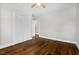 Cozy bedroom with hardwood floors, closet, and neutral paint at 809 Leon St, Durham, NC 27704