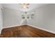 Bedroom with hardwood floors, ceiling fan, and good natural light at 809 Leon St, Durham, NC 27704