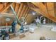 Unfinished attic space showcasing the home's structure and storage potential at 8304 Epping Forest Way, Wake Forest, NC 27587
