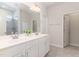 Bright bathroom features a double sink vanity with ample counter space and modern fixtures at 8616 Deep Elm Dr, Wake Forest, NC 27587
