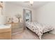Charming Bedroom with a crib and a bed, decorated with playful animal wall decals at 8616 Deep Elm Dr, Wake Forest, NC 27587
