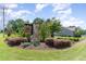 Landscaped entrance to 'The Grove at Kanata Hills' community at 8616 Deep Elm Dr, Wake Forest, NC 27587