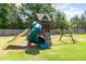 Backyard playground area with a slide and swingset at 8616 Deep Elm Dr, Wake Forest, NC 27587
