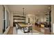 Inviting dining area featuring a large dining table, stylish decor and bright, airy space at 909 Oberlin Rd, Raleigh, NC 27605