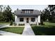 Charming craftsman-style home with a welcoming front porch and well-maintained landscaping at 909 Oberlin Rd, Raleigh, NC 27605