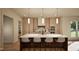 Contemporary kitchen features a large island with seating, modern lighting, and stainless steel appliances at 909 Oberlin Rd, Raleigh, NC 27605