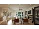 Bright living room boasts hardwood floors, a fireplace, and stylish decor with a view of the yard at 909 Oberlin Rd, Raleigh, NC 27605
