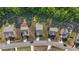 An aerial view of the community showcasing well-maintained lawns and tree-lined streets on a bright day at 94 Shooting Star Ln, Clayton, NC 27520