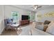 Bright living area featuring wood floors and plenty of natural light at 94 Shooting Star Ln, Clayton, NC 27520