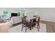 Spacious living room featuring wood floors and lots of natural lighting at 94 Shooting Star Ln, Clayton, NC 27520