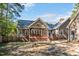 Large backyard with a deck, fire pit and fenced-in area, great for entertaining at 100 Bradborne Cir, Clayton, NC 27520