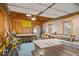 Bright, detached garage offers a well lit workspace with a large table, tools, and a saw at 100 Bradborne Cir, Clayton, NC 27520