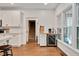 Well-lit kitchen area with granite countertops, stainless steel appliances, and a wine cooler at 100 Bradborne Cir, Clayton, NC 27520