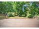 Spacious back deck perfect for outdoor gatherings and overlooking the tranquil, wooded backyard at 104 Ludstone Ct, Cary, NC 27513