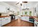 Bright kitchen with stainless steel appliances, butcher block counters, and ample cabinet space, great for cooking at 104 Ludstone Ct, Cary, NC 27513