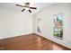 Spacious living room with beautiful crown molding and natural light streaming through the windows at 104 Ludstone Ct, Cary, NC 27513