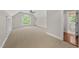 Spacious bonus room offers natural light at 10825 Rondeau Woods Ct, Raleigh, NC 27614