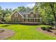 Beautiful brick home with manicured lawn and lovely landscaping at 10825 Rondeau Woods Ct, Raleigh, NC 27614